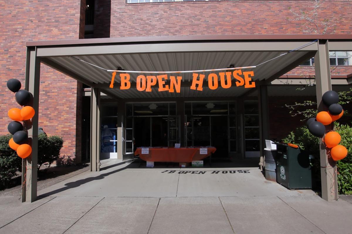 "IB OPEN HOUSE" over the entryway of Cordley Hall.