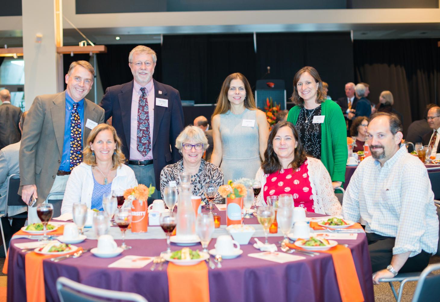 A group of Integrative Biology faculty and advisors and their guests celebrate at University Day dinner