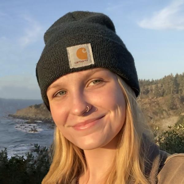 headshot of Nicole Miller at the coast