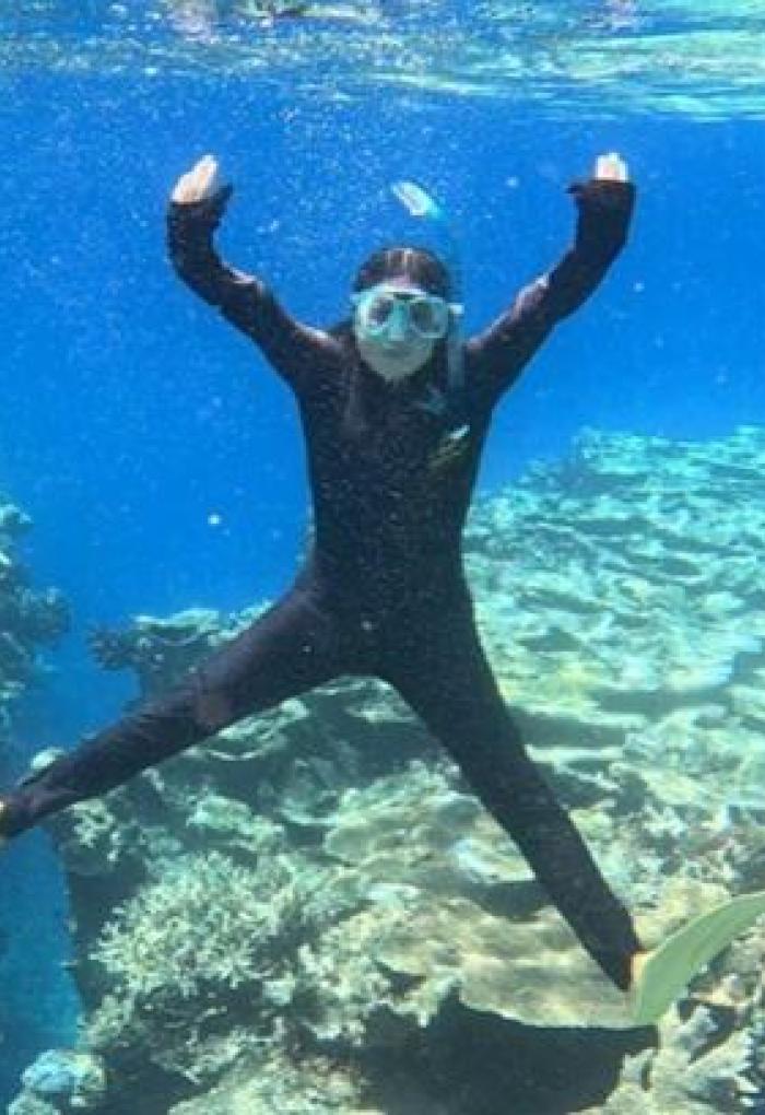 Anna Benson snorkels on the Great Barrier Reef.