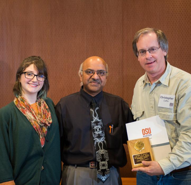 Loyd Carter award winner Chris Coffin and his student Sarah Devine with Dean Sastry Pantula