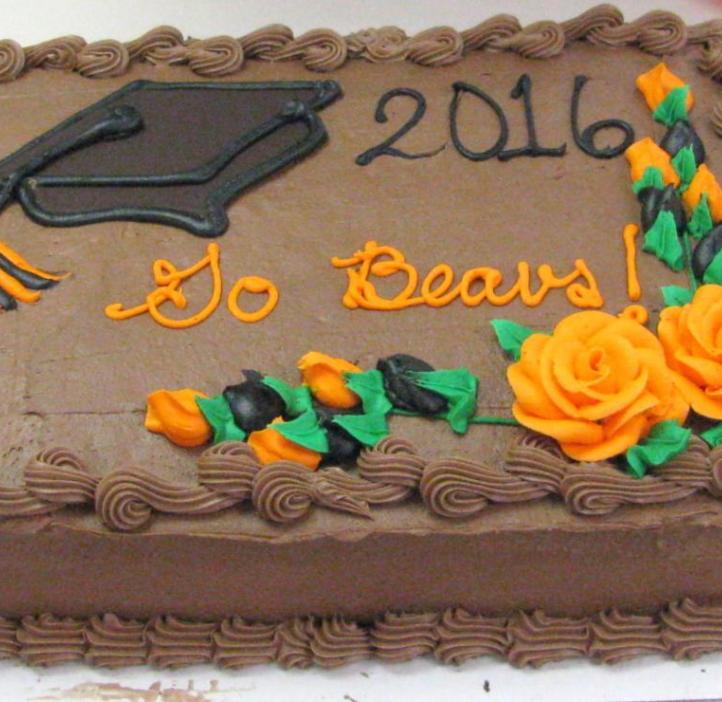 A chocolate cake with the text "2016" and "Go Beavs"